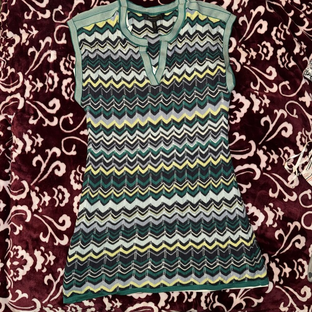 BCBGMAXAZRIA is known for elevated knitwear that merges comfort with couture